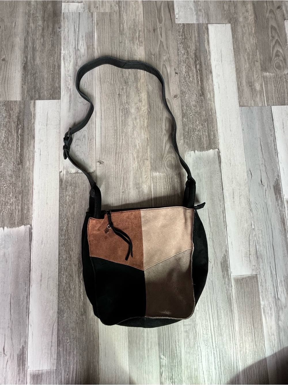 The Sak Patchwork Suede Crossbody in Black, Brown, Tan
